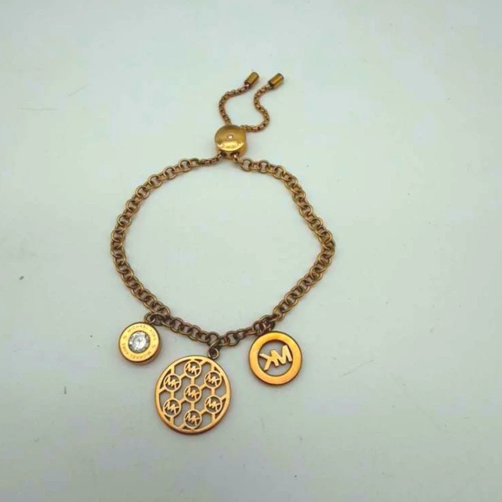 Michael Kors‎ Adjustable Gold Tone Charm Bracelet MK Logo Disc